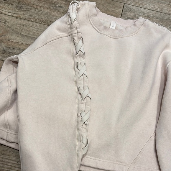 Lululemon Light Pink Cropped Sweatshirt with Lace-Up Sleeves Size 8 - Picture 2 of 7